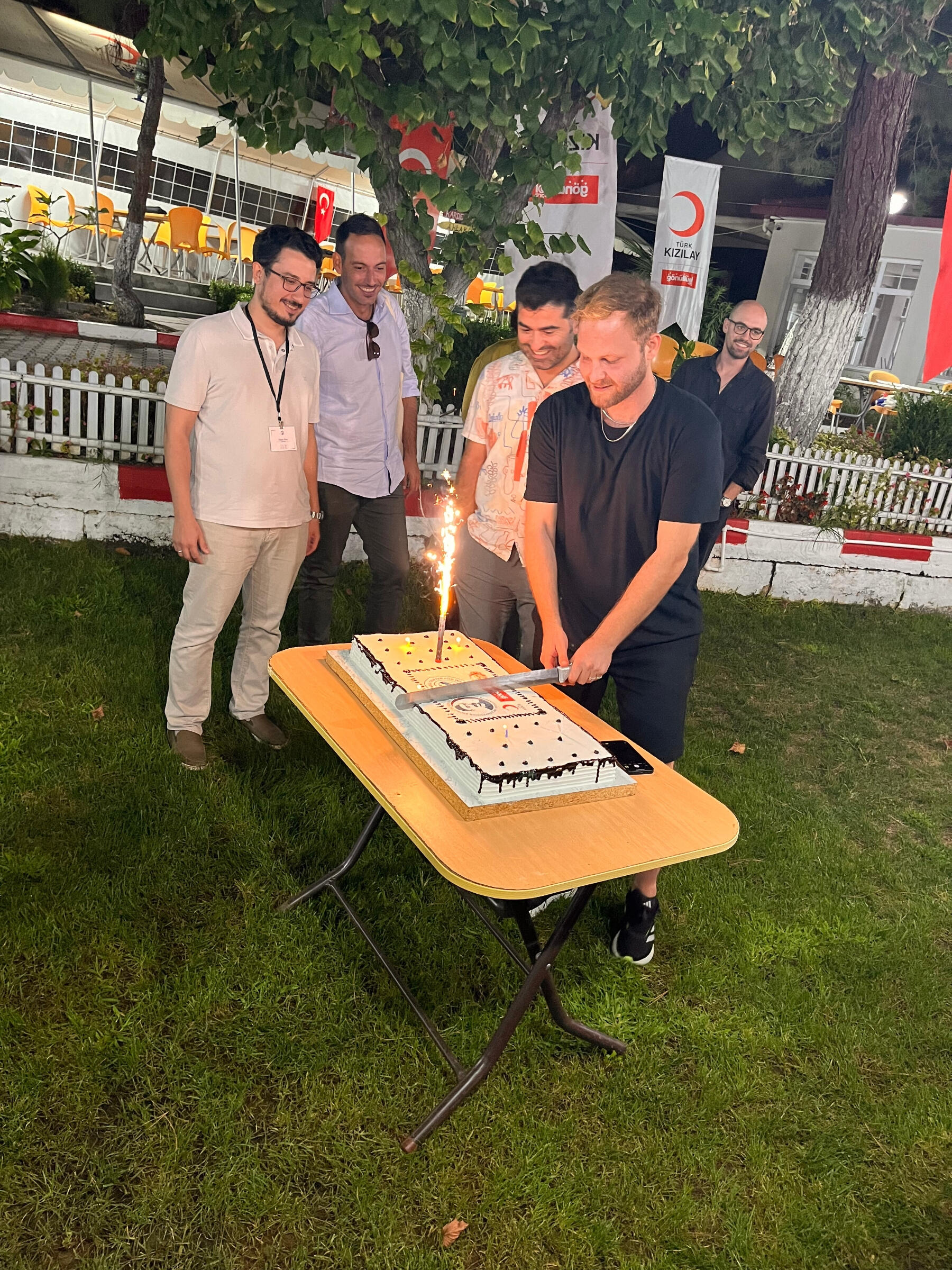 Mustafa Can Sati, along with some other members of the Organizing team and lecturers, cut the Cake on the final evening!