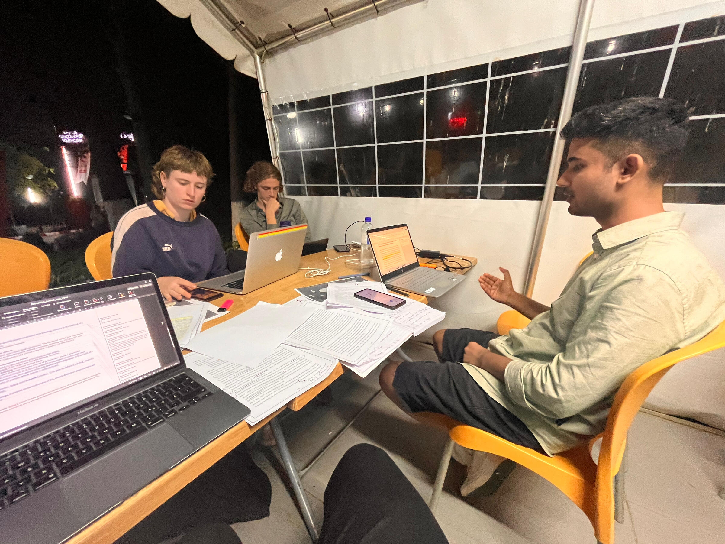 Late night session preparing for the final on the next morning (left to right: Paula, Oscar, Sashwat)